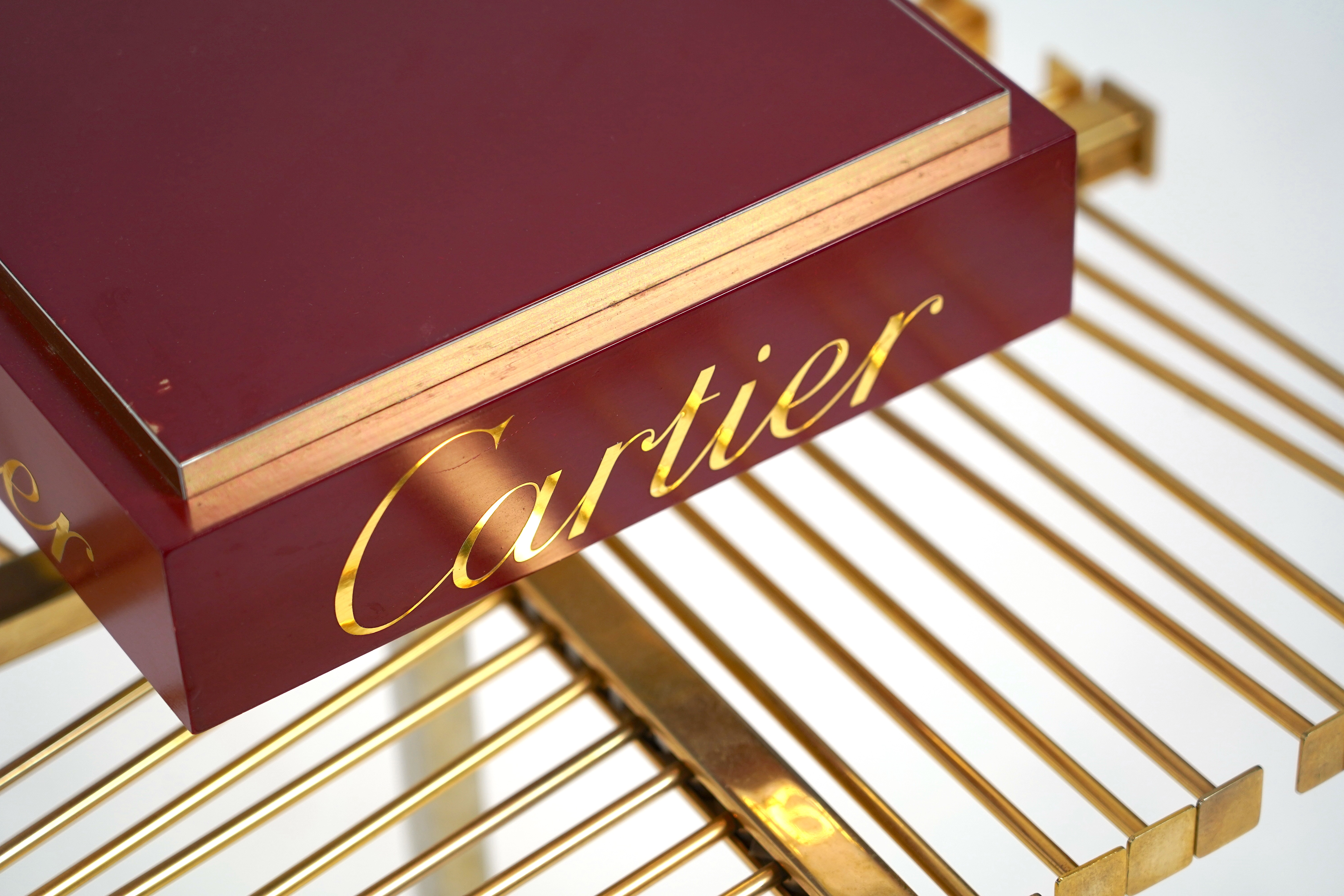 A Cartier vintage scarf rack.